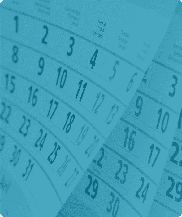 Blue-toned calendar pages representing maintenance scheduling and planning concepts—used in Reliability Academy’s Planning & Scheduling training course materials