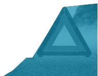 Warning triangle on roadside—used in Reliability Academy’s DE200 course to represent risks and failures addressed through defect elimination strategies