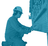 Preventive maintenance technician inspecting electrical control panel—used in Reliability Academy’s PM300 course on advanced preventive maintenance practices